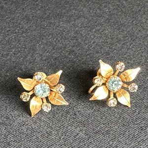 Vintage BN earrings gold tone with light blue stone agua marine color .